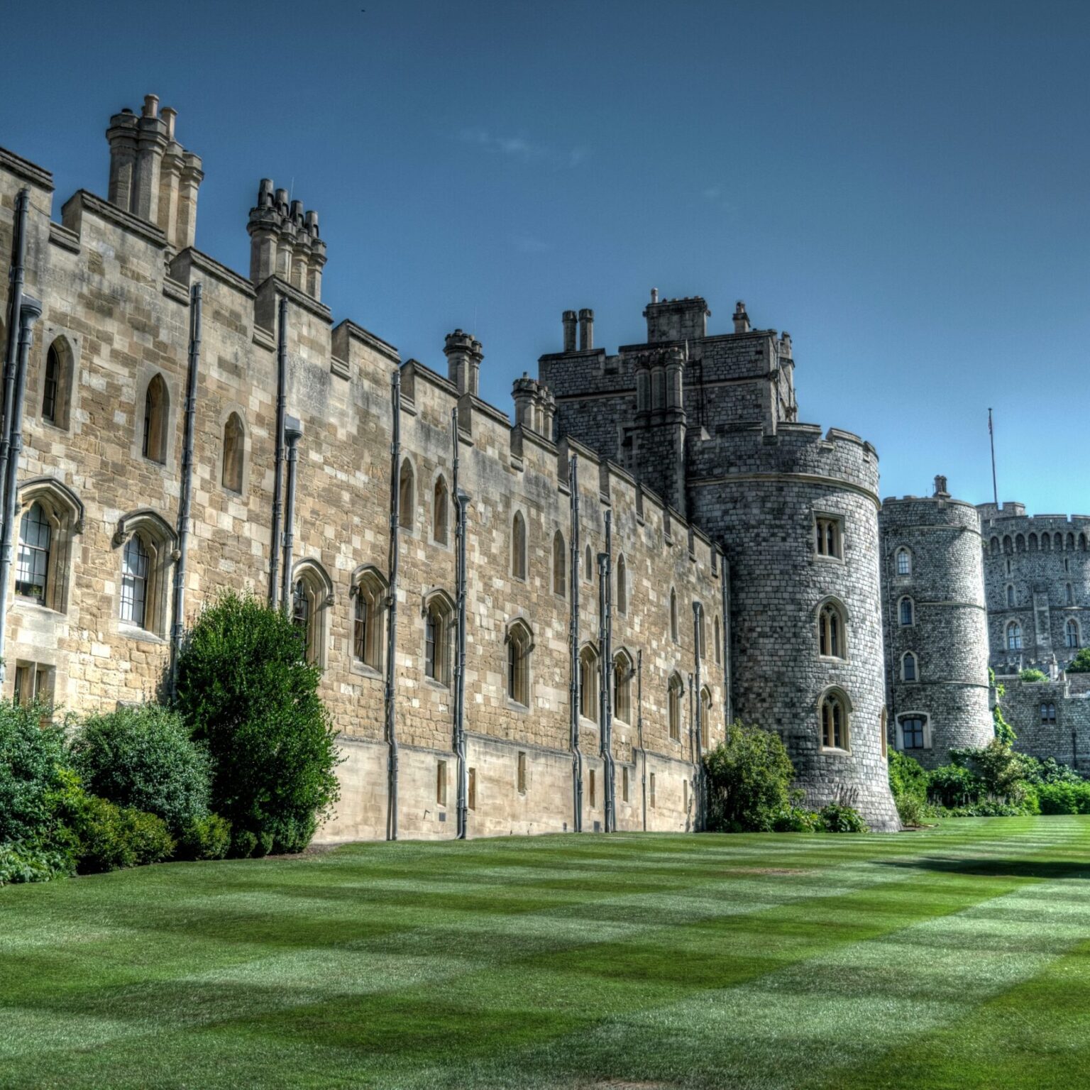 A low angle shot of St George's Chapel  in the middle of a park in Windsor, UK